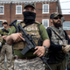 Illustration for article titled Right-Wing Militia Wondering When Someone Will Notice They’ve Been Holding J.B. Pritzker Hostage For Months